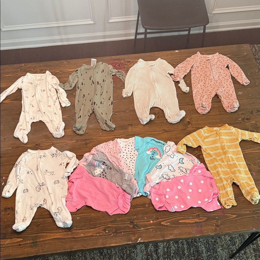 Newborn sized zipper footie pajamas and Onesie Bundle
